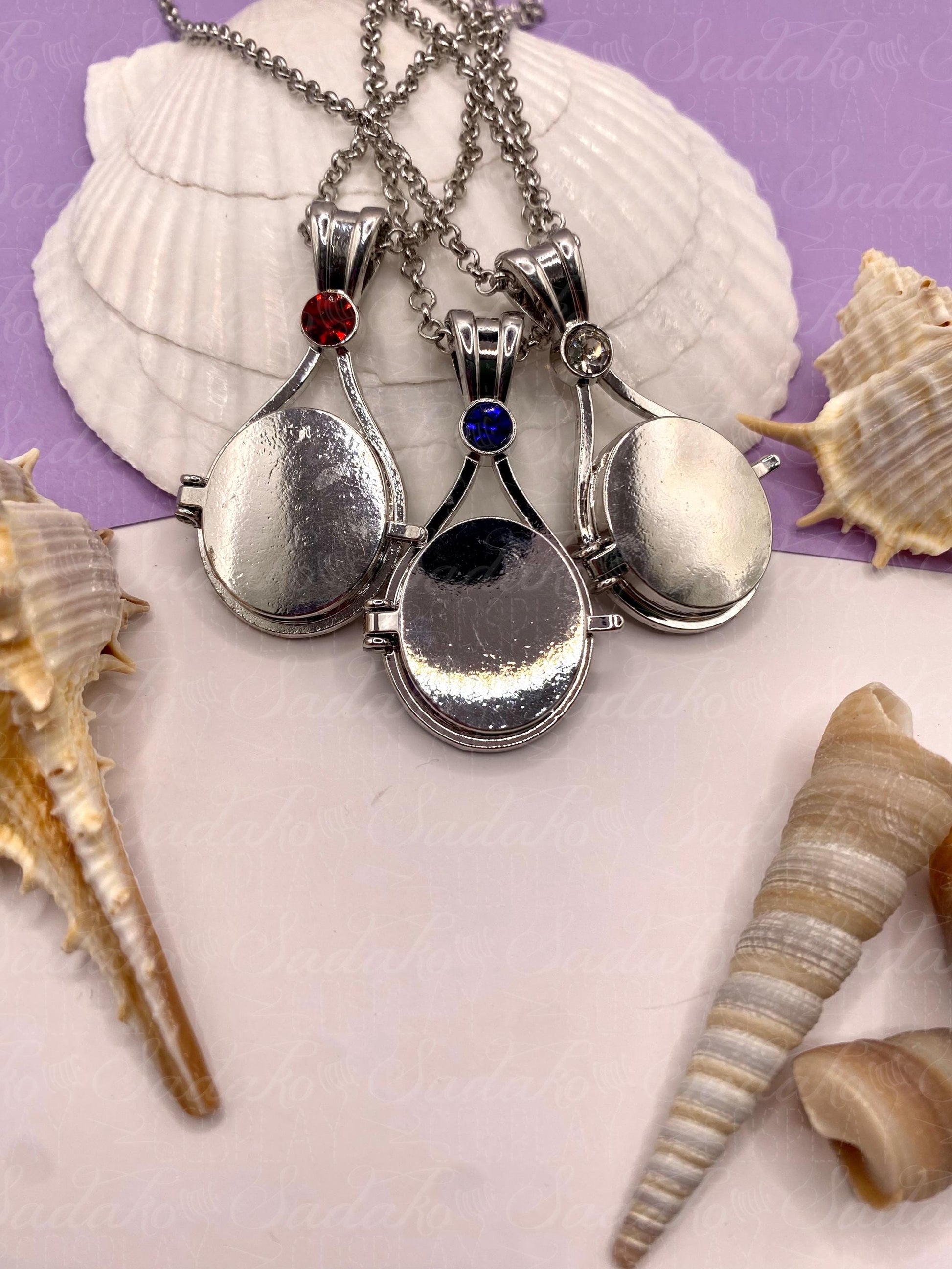 Meerjungfrau Schmuck Amulett silbern mit farbigem Stein, H2O just add water