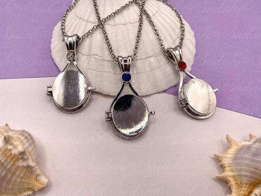 Meerjungfrau Schmuck Amulett silbern mit farbigem Stein, H2O just add water