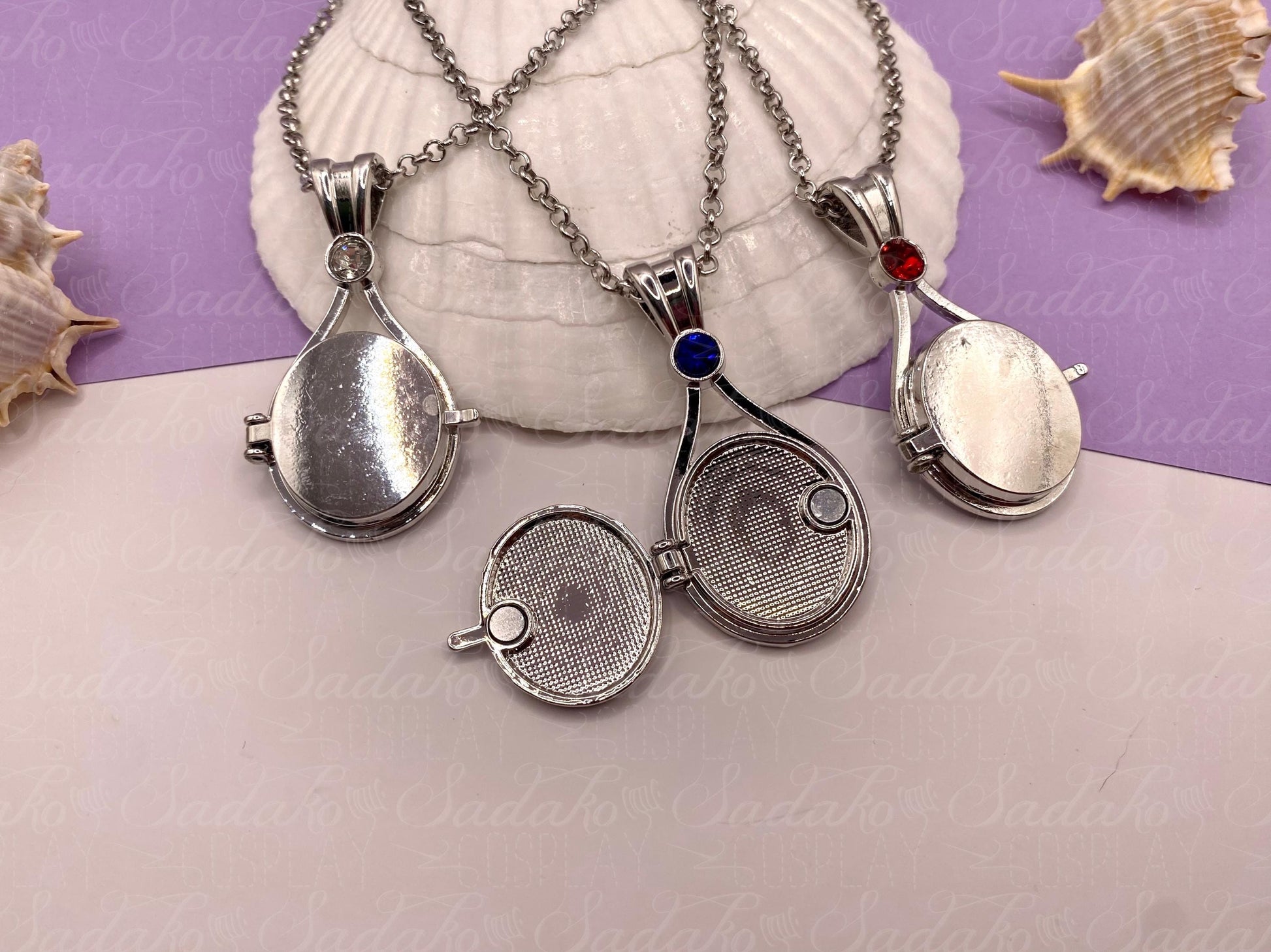 Meerjungfrau Schmuck Amulett silbern mit farbigem Stein, H2O just add water